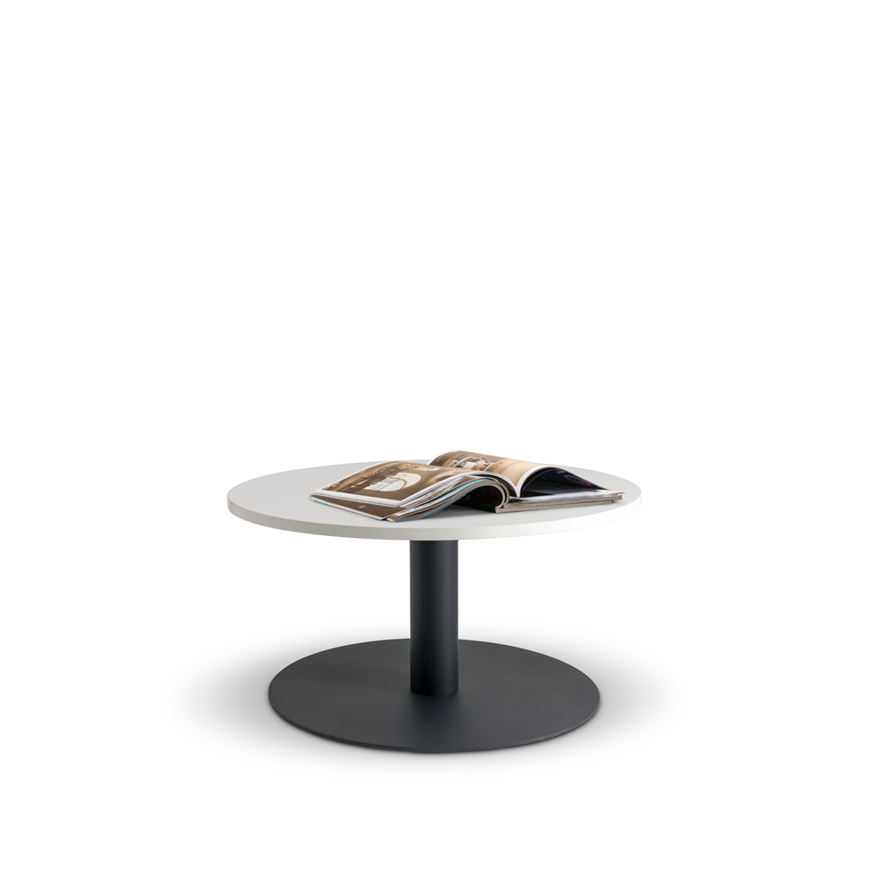 Home Office Space NZ's Lunar 600 Coffee Table, featuring a durable melamine top and sleek black pedestal base, is topped with an open book displaying images and text. The modern round design stands out against a plain white background.