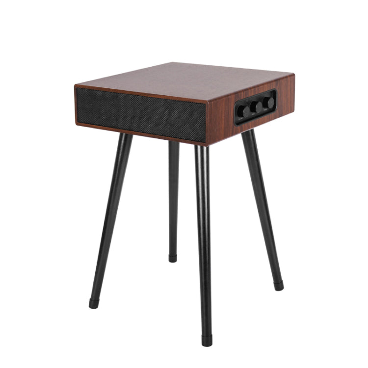 The MySound Blues Bluetooth Speaker Side-Table by Home Office Space NZ is a small, vintage-style piece with a black grille and side knobs, elegantly perched on four slender black metal legs and featuring wireless device charging for your convenience.